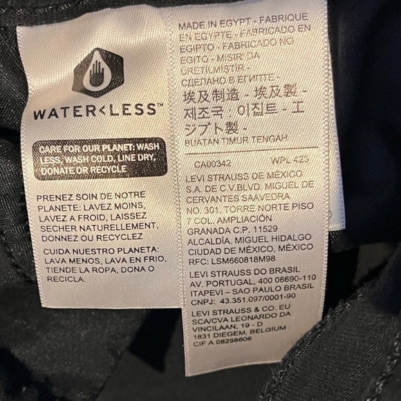 Levi's stretchy black boot cut jean size 27" inseam is 32". - Picture 6 of 9